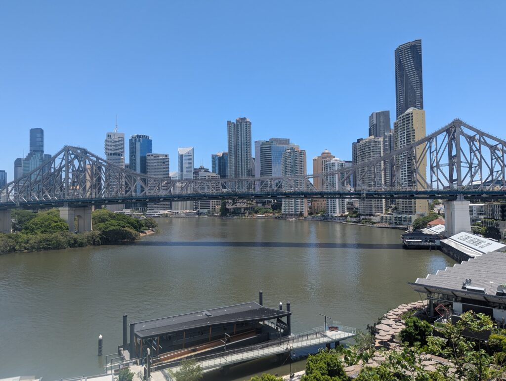 Brisbane skyline with river and bridge.